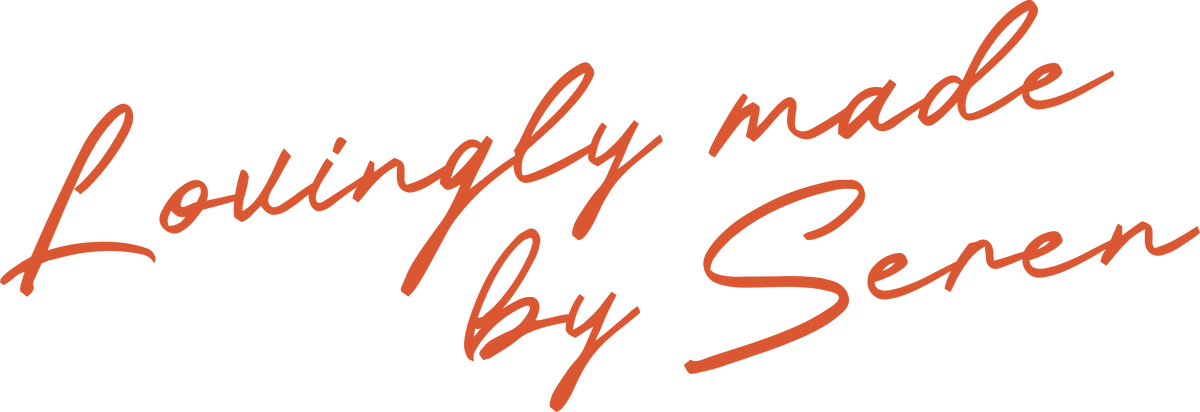 Decorative text 'Lovingly made by Seven' in a cursive font